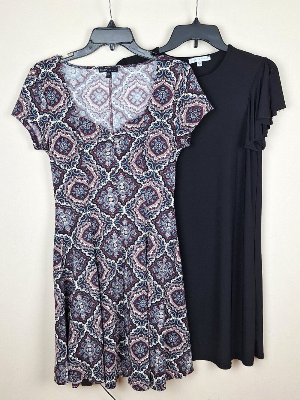 Lot of 2 dresses. Size S Little Black Dress. Size M Multicolor Paisley Milkmaid